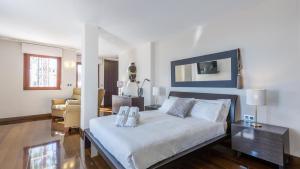 a bedroom with a bed and a living room at Casa Aisea 2 Torre del Mar by Ruralidays in Torre del Mar +26 photos