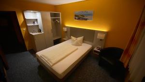 Postel nebo postele na pokoji v ubytování Hotel Windspiel