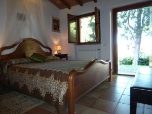 Postel nebo postele na pokoji v ubytování B&B Cà Giovanni Country Resort + 37 fotografií
