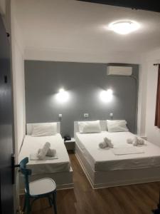 Postel nebo postele na pokoji v ubytování Sparta Team Hotel