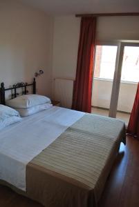 Postel nebo postele na pokoji v ubytování Guesthouse Promenade