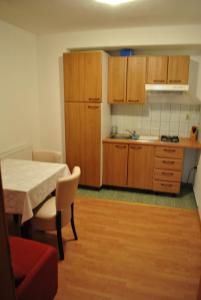 Kuchyň nebo kuchyňský kout v ubytování Guesthouse Promenade
