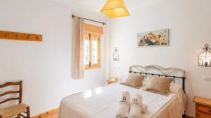 Ein Bett oder Betten in einem Zimmer der Unterkunft Cuesta Blanca Montilla by Ruralidays