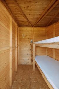 Postel nebo postele na pokoji v ubytování Event Lodge Glamping Spielberg