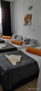 Letto o letti in una camera di Bed and Breakfast M Jasmin