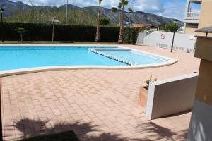 The swimming pool at or close to Xeraco Beach Alma