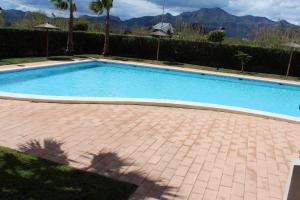 The swimming pool at or close to Xeraco Beach Alma