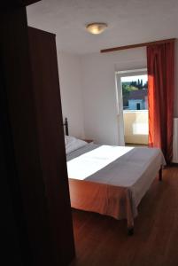 Postel nebo postele na pokoji v ubytování Guesthouse Promenade