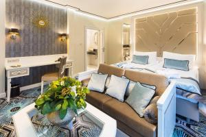 Łóżko lub łóżka w pokoju w obiekcie Hotel Royal Baltic 4* Luxury Boutique