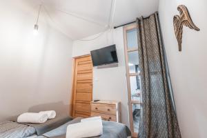 Postel nebo postele na pokoji v ubytování Bystry Comfort