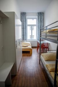 Posteľ alebo postele v izbe v ubytovaní Cuba Bar & Hostel