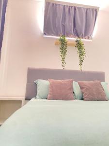 Łóżko lub łóżka w pokoju w obiekcie Best Rooms - Quarto 1 Plateau