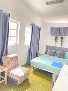 Łóżko lub łóżka w pokoju w obiekcie Best Rooms - Quarto 1 Plateau