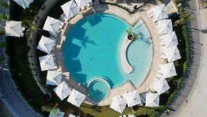 an overhead view of a swimming pool in a building at Flaminio Village Bungalow Park in Rome