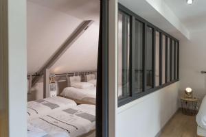 Postel nebo postele na pokoji v ubytování Gîte de charme à la campagne + 16 fotografií