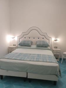 Cama o camas de una habitación en Albergo S. Andrea