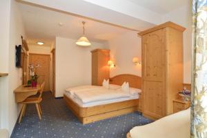Postel nebo postele na pokoji v ubytování Hotel Silvana