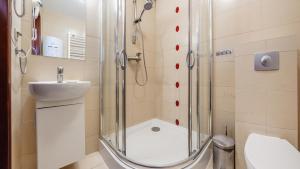 Łazienka w obiekcie Apartamenty Sun & Snow Lido Sarbinowo