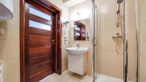 Łazienka w obiekcie Apartamenty Sun & Snow Lido Sarbinowo
