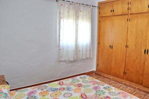 Posteľ alebo postele v izbe v ubytovaní Chalet Cortijo 31
