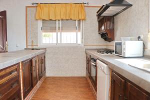 Kuchyňa alebo kuchynka v ubytovaní Chalet Cortijo 31