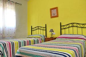 Posteľ alebo postele v izbe v ubytovaní Chalet Cortijo 31