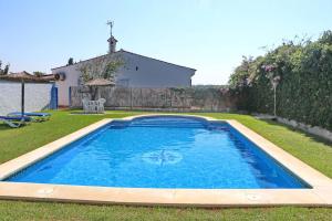 Bazén v ubytovaní Chalet Cortijo 31 alebo v jeho blízkosti