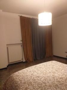 Postel nebo postele na pokoji v ubytování Executive center rooms