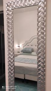 Cama o camas de una habitación en Albergo S. Andrea