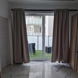Balkón alebo terasa v ubytovaní Apartamenty nad jeziorem Białym KA-BOATS