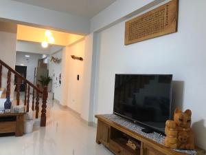 TV a/nebo společenská místnost v ubytování Sunshine Fonda Homestay