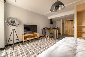 Posteľ alebo postele v izbe v ubytovaní Kazalnica Family&Conference Resort