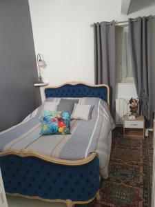 Postel nebo postele na pokoji v ubytování AUBENAS, VALS LES BAINS, LABEGUDE, Maison de vacances Bensylv' entière privatif de 130 M2 4 lits 3 chambres pour 4 adultes et 2 enfants