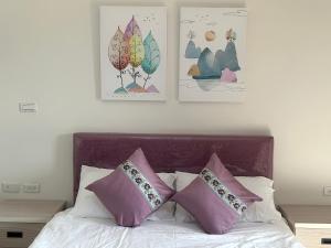 Postel nebo postele na pokoji v ubytování Sunshine Fonda Homestay