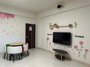 TV a/nebo společenská místnost v ubytování Sunshine Fonda Homestay