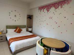Postel nebo postele na pokoji v ubytování Sunshine Fonda Homestay