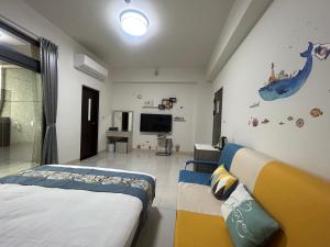 Postel nebo postele na pokoji v ubytování Sunshine Fonda Homestay