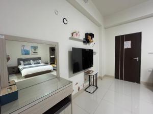 TV a/nebo společenská místnost v ubytování Sunshine Fonda Homestay