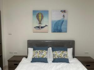 Postel nebo postele na pokoji v ubytování Sunshine Fonda Homestay