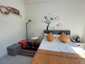 Postel nebo postele na pokoji v ubytování Sunshine Fonda Homestay