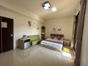 Postel nebo postele na pokoji v ubytování Sunshine Fonda Homestay