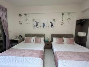 Postel nebo postele na pokoji v ubytování Sunshine Fonda Homestay