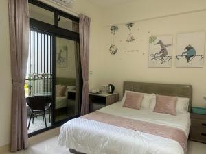 Postel nebo postele na pokoji v ubytování Sunshine Fonda Homestay