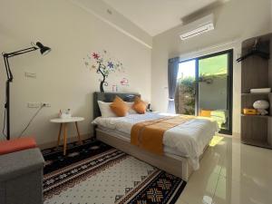 Postel nebo postele na pokoji v ubytování Sunshine Fonda Homestay