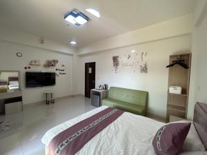 TV a/nebo společenská místnost v ubytování Sunshine Fonda Homestay