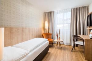 Postel nebo postele na pokoji v ubytování Hotel Flandrischer Hof + 30 fotografií