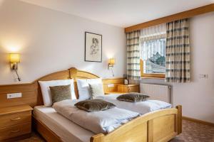 Postel nebo postele na pokoji v ubytování Ciasa Alfred App 6 Personen