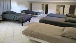 Postel nebo postele na pokoji v ubytování Demeure du Dragon 5 chambres Piscine- 10 lits - personnes