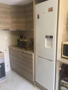Kuchyňa alebo kuchynka v ubytovaní Studio idéal pour deux voyageurs sur Marseille