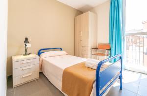 Cama o camas de una habitación en Albergue "El Río"